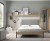 Dormitorio con cama doble, con paneles con estantes revisteros, colgadores y cajones
